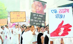 Girls of Divya Jyoti Jagran Sansthan take out a rally against female foeticide in Amritsar on Saturday. 