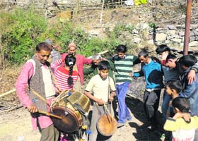 Residents of Kharak village, 50 km from Mussoorie, celebrate Bagwali festival on Saturday