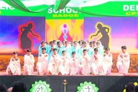 Students of Delhi Public School present a cultural item during the school badge award ceremony in Dehradun on Saturday