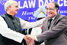 Chief Justice SH Kapadia with Union Minister for Law & Justice and Minority Affairs Salman Khurshid during Law Day Celebrations in New Delhi on Saturday.