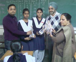 President IAP Dr HS Narang and Dr Amit Aggarwal giving away prizes at the KV 4 school in Bathinda