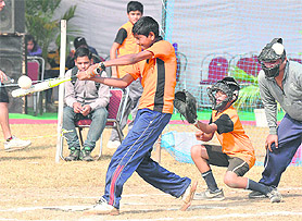 A player in action during the 24th Sub-Junior National Softball Championship at PEC University of Technology in Chandigarh on Sunday.