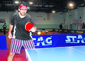 A player plays a shot during a table tennis match at TT Hall, Sector 23, Chandigarh, on Sunday. Tribune Photo: S. Chandan