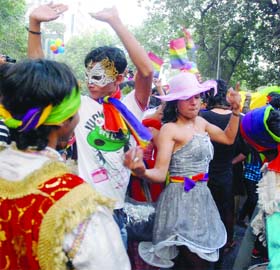 Supporters and members of the lesbian, gay, bisexual and transgender community (LGBT) take part in the Delhi Queer Pride Parade 2011 at Jantar Mantar in New Delhi on Sunday