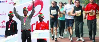 Winners of the Airtel Delhi Half Marathon 2011  Geoffrey Kipsang of Kenya, Lelisa Desisa of Ethiopia and Mike Kigen of Kenya  in New Delhi on Sunday; (Right) Participants run at the event