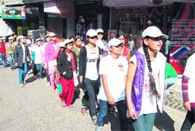 Students take out an awareness march in Mussoorie on Sunday