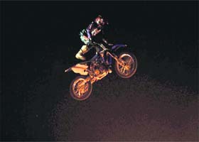 A stunt biker displays his skills in Gurgaons Leisure Valley Park on Saturday night