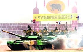 T90 tanks of an armoured regiment take part in a parade at the Black Elephant Division in Patiala on Sunday