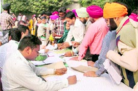 Riot victims submit forms for the regularisation of flats in Ludhiana on Sunday