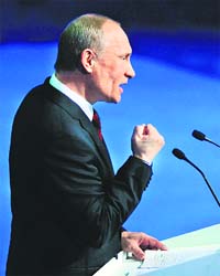 POWER POINT: Russian Prime Minister Vladimir Putin delivers a speech at the ruling United Russia party congress in Moscow on Sunday