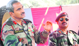 Deputy Director General (Recruiting) Brig Vinod Raizada (left) addresses a press conference in Amritsar on Monday. 