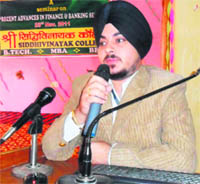 Simardeep Singh from HDFC Bank speaks on the latest style of working of private banks at Shree Siddhivinayak Engineering and Management Institutions, Yamunanagar.