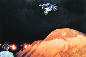 Stunt bikers perform during an event in Gurgaon. 