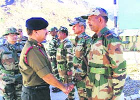Major-Gen VK Yadav interacts with Army personnel at the Palchan transit camp on Monday