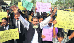 Pakistani lawyers rally to condemn NATO strikes on Pakistani troops, in Karachi 