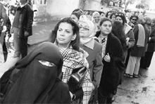 Egyptian women line-up outside a polling centre in Cairo on Monday. 