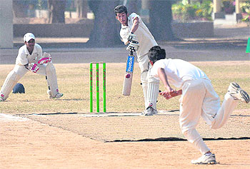A DAV Model School batsman drives the ball during the final match against St Annes School at Sector 32, Chandigarh, on Tuesday. 