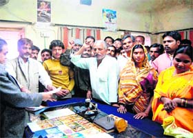 Residents hold a protest in the District Food and Supplies Office in Haridwar on Tuesday