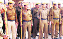 Police personnel get ready to proceed towards polling booths in Ratia on Tuesday. 