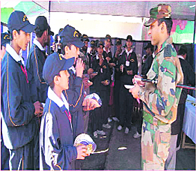Students interact with Col Vikram Singh Guleria, Commanding Officer, 10 Rashtriya Rifles (RAJPUT), in Udhampur.