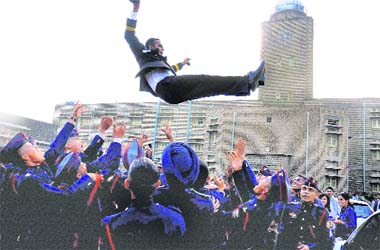 ON A HIGH: Jubilant cadets after their passing-out parade at the National Defence Academy in Pune on Tuesday