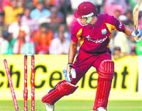 West Indies Marlon Samuels is bowled by Varun Aaron during the first one-day international in Cuttack