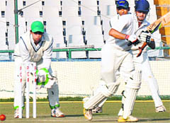 Punjabs Uday Kaul plays a shot against Railways in Mohali 