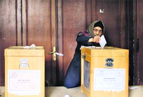 A man casts his vote in Cairo