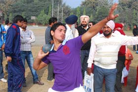 Jagteshwar Sharma taking part in a shot put event during the district-level athletic meet in Bathinda