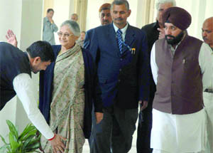 CM Sheila Dikshit and transport minister Arvinder Singh Lovely at the Delhi Assembly.
