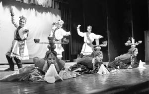 Artistes perform at a cultural function organised by the Munir Cultural Forum at the Gaiety Theatre in Shimla on Wednesday.