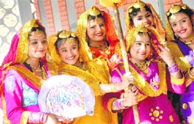 Girl students await their turn for a group song competition at GNPS, Sarabha Nagar, in Ludhiana on Wednesday