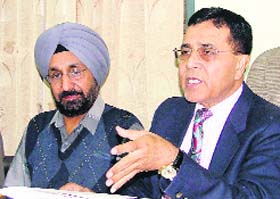 The Civil Surgeon, Dr Subhash Batta (right), addresses mediapersons in Ludhiana on Wednesday