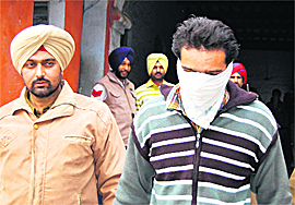 The accused in police custody in Amritsar on Thursday.