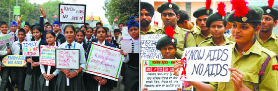 (Left) Students of Police DAV Public School hold placards carrying messages related to AIDS, during an awareness rally organised to mark the World AIDS Day in Bathinda on Thursday; NCC cadets take part in the rally to spread awareness on the disease. 