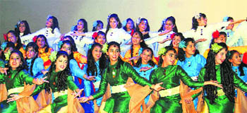 Students present a dance during the annual function of Sat Paul Mittal School in Ludhiana on Thursday. 
