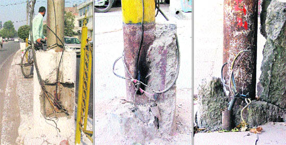 Electricity poles with wires hanging lose near Bharat Nagar Chowk, Rakh Bagh and Bhadaur House.