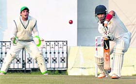 Punjabs Mandeep Singh plays a shot against Railways at the PCA Stadium in Mohali on Thursday