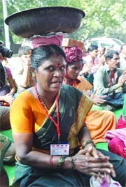 Daily wage labourers protest under the banner of the Unorganised Workers Federation in New Delhi on Friday. 