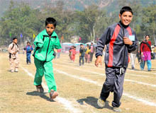 Special children take part in a race during a sports meet at Paddal Maidan in Mandi on Friday