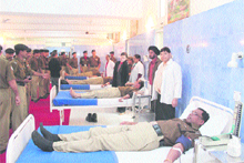 Jawans of the BSF donate blood on the occasion of 47th Raising Day of the force in Jammu on Friday