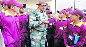 An Army officer interacts with students at Mahore. 