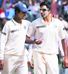Spinners Prayan Ojha (L) and R Ashwin. It will be a challenge for Ashwin in Australia but he looks to be a better bet than Harbhajan 