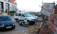 Vehicles parked in the No Parking area of a mall in the city only sends an invitation to vehicle lifters