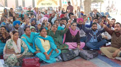 Members of the Multi-purpose Health Employees Union staging a protest in favour of their demands, on the premises of the Civil Hospital in Bathinda 