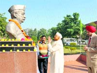 Governor Jagannath Pahadia pays floral tributes to