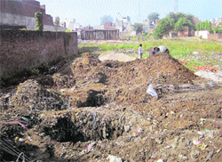 A file photo of the construction work on the disputed land at Tikhowal 