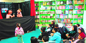 Visual delight Children enjoy a puppet show in Amritsar on Sunday.