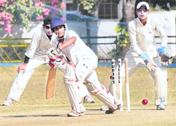 A player of Knight Riders plays a shot against Kings XI at the Phase-IX ground in Mohali on Sunday.