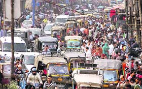 SUNDAY BLUES Owing to encroachments by vendors along the busy Old GT Road, commuters face a tough time crossing the area around Jyoti Chowk in Jalandhar on Sunday